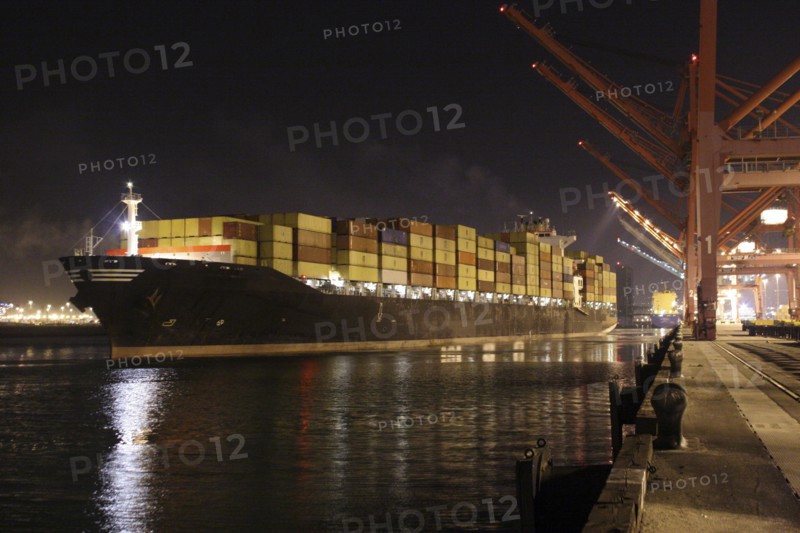 Cargo containers on freighter in port