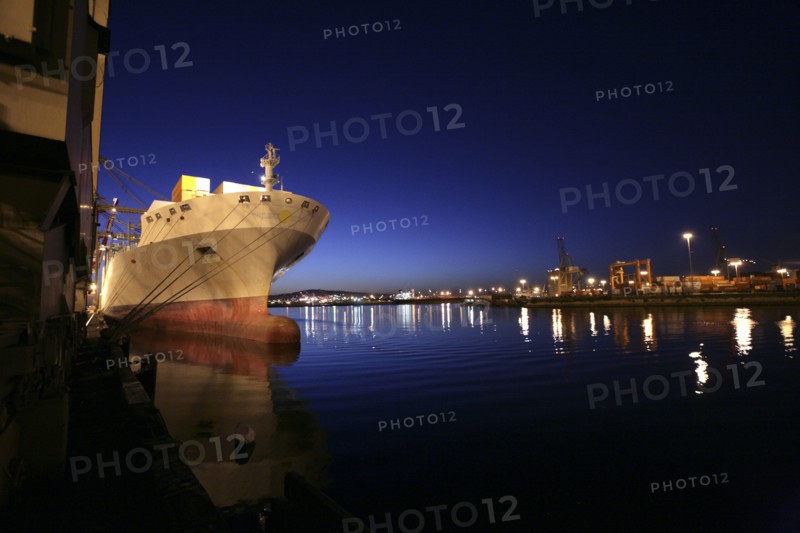 Freighter in port at night