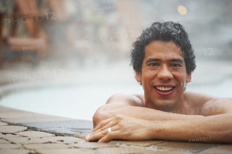 Man sitting in hot tub