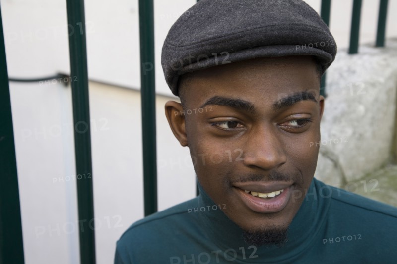 Close up of face of curious Black man