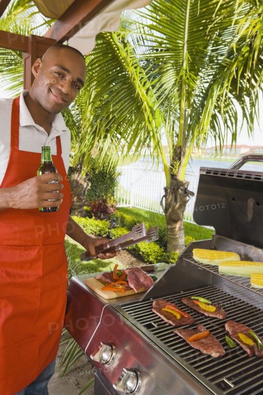 African man barbecuing