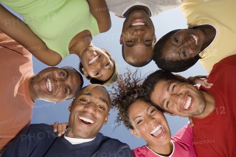 Multi-ethnic friends in huddle