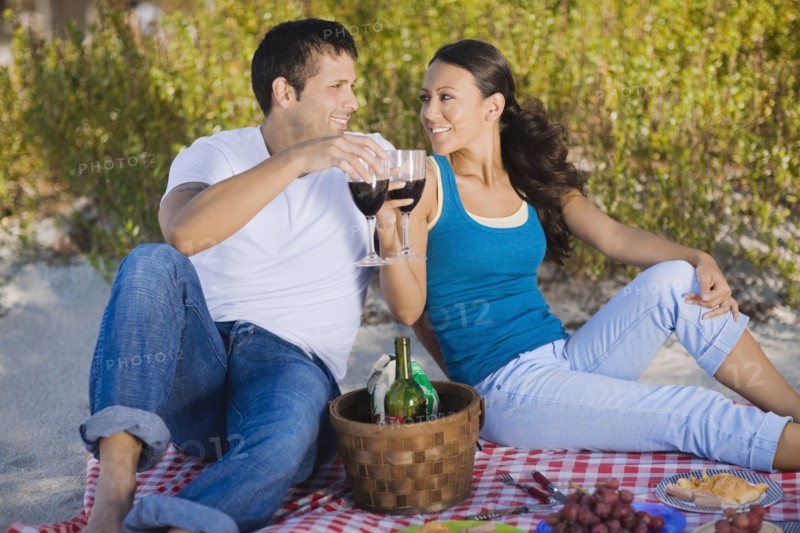 Hispanic couple having picnic