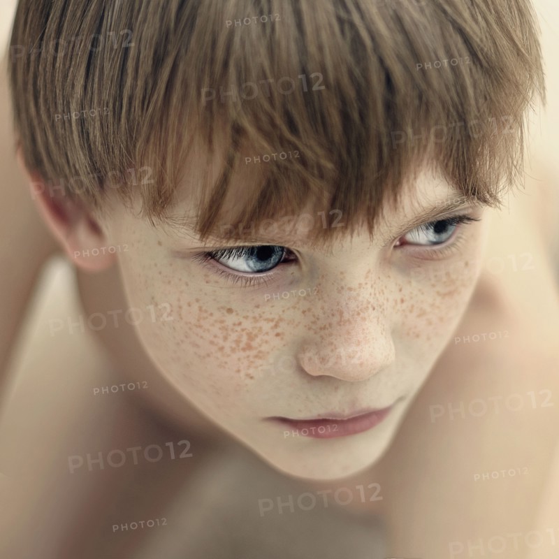 Close up of Caucasian boy's face
