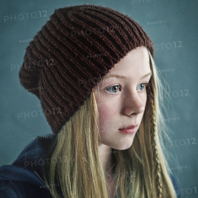 Teenage girl wearing knitted cap