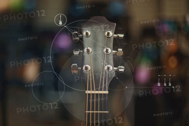 Close up of guitar overlaid with graphic design