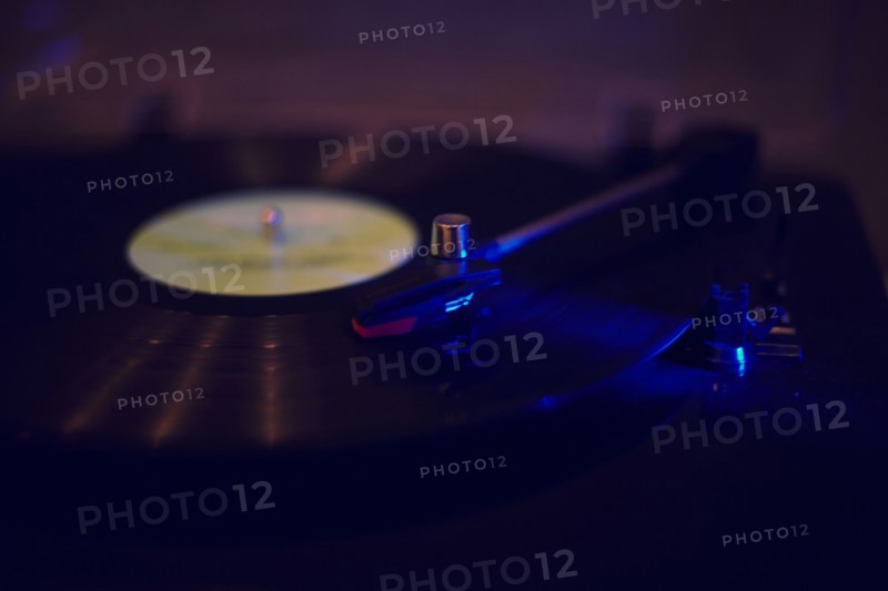 Close up of turntable playing vinyl record