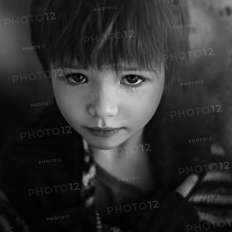 Close up of sad Caucasian girl looking up