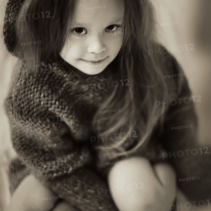 Caucasian girl wearing knitted sweater