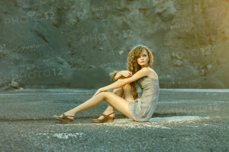 Caucasian woman sitting in quarry