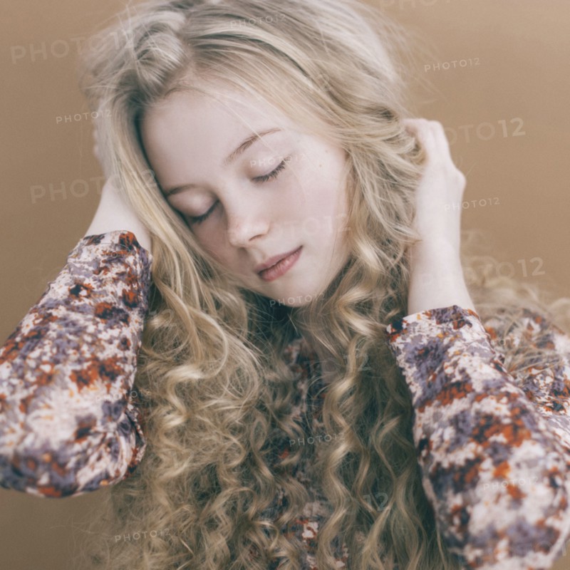 Portrait of Caucasian teenage girl with blonde hair
