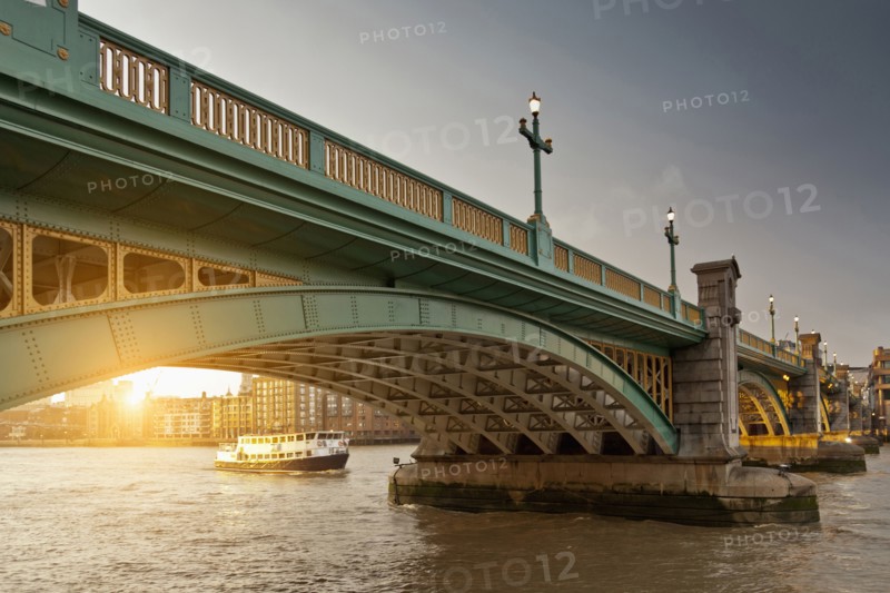 Boat and urban bridge