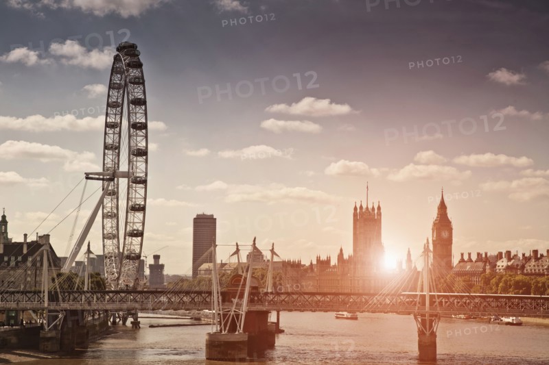 Sunset over bridge and London Eye