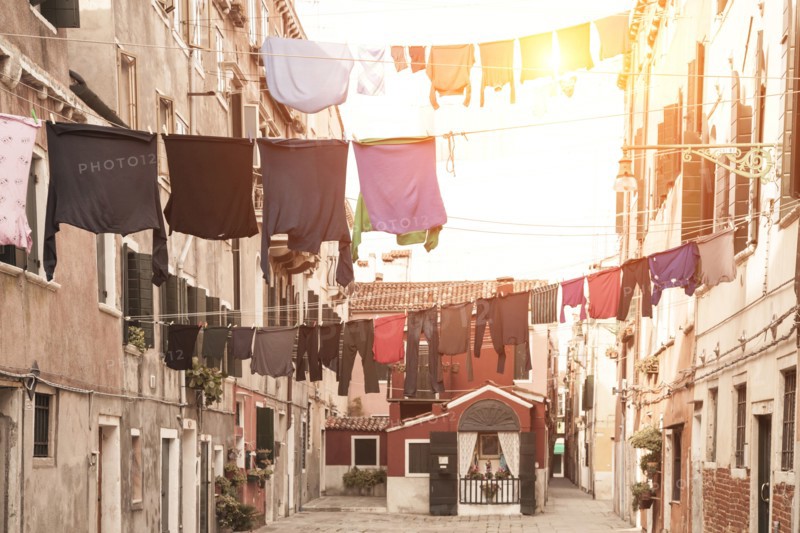 Laundry hanging from apartment buildings