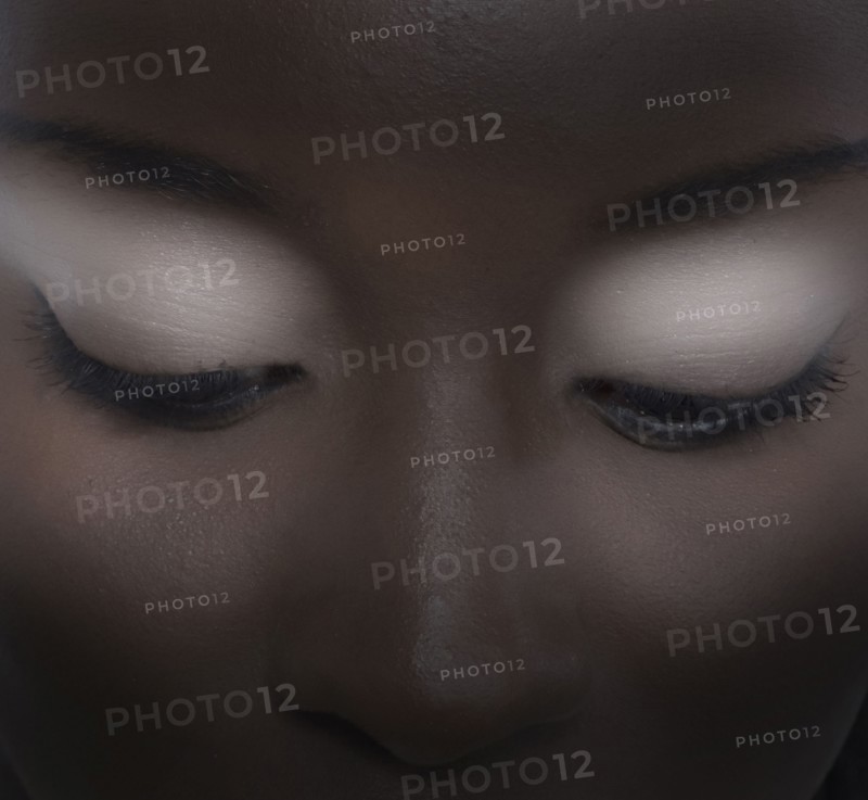 Close up of woman wearing eyeshadow