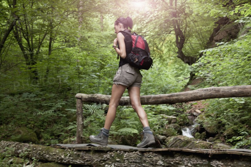 Caucasian woman hiking in forest