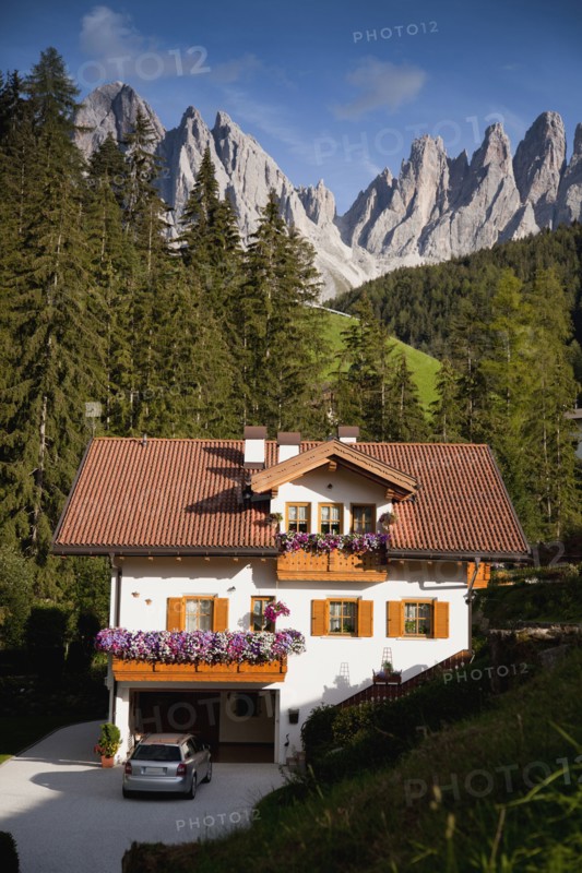 House in remote mountain landscape