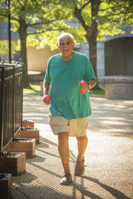 Hispanic man walking in park