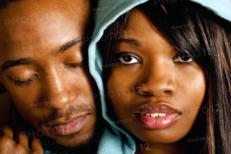 African couple hugging
