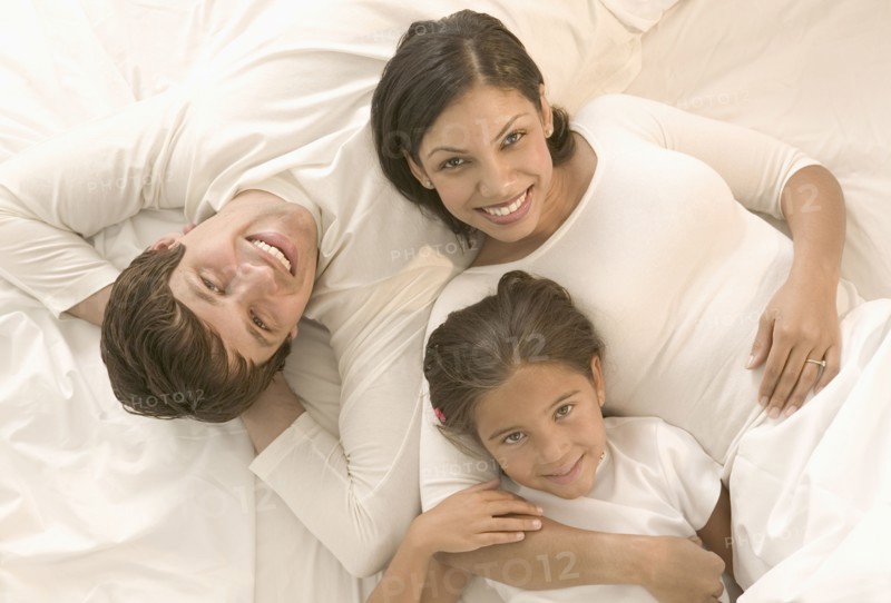 Portrait of family laying down