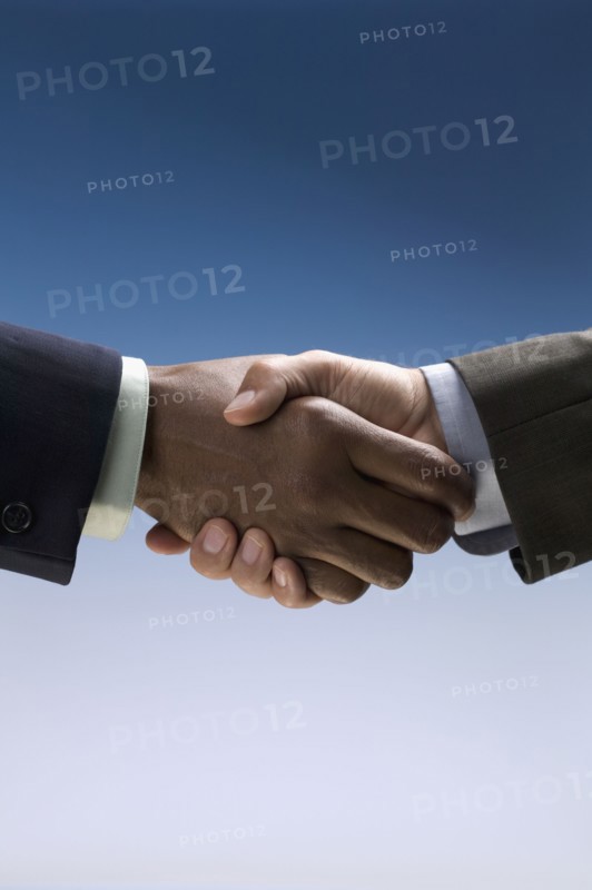 Close up of businessman's handshake
