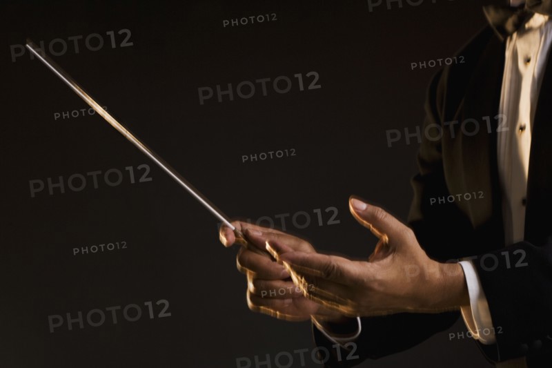 Close up of hands conducting
