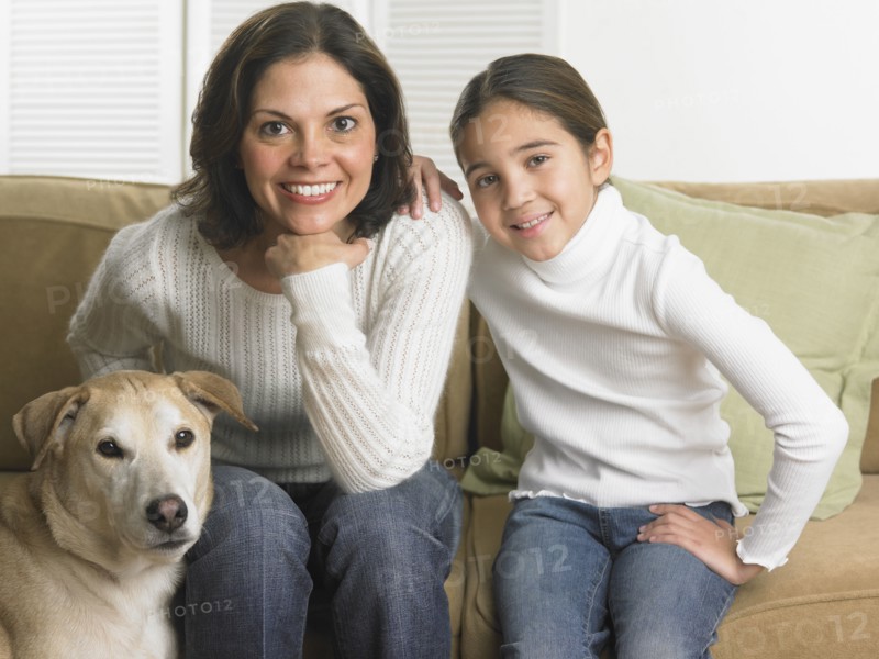 Mother and daughter smiling for the camera