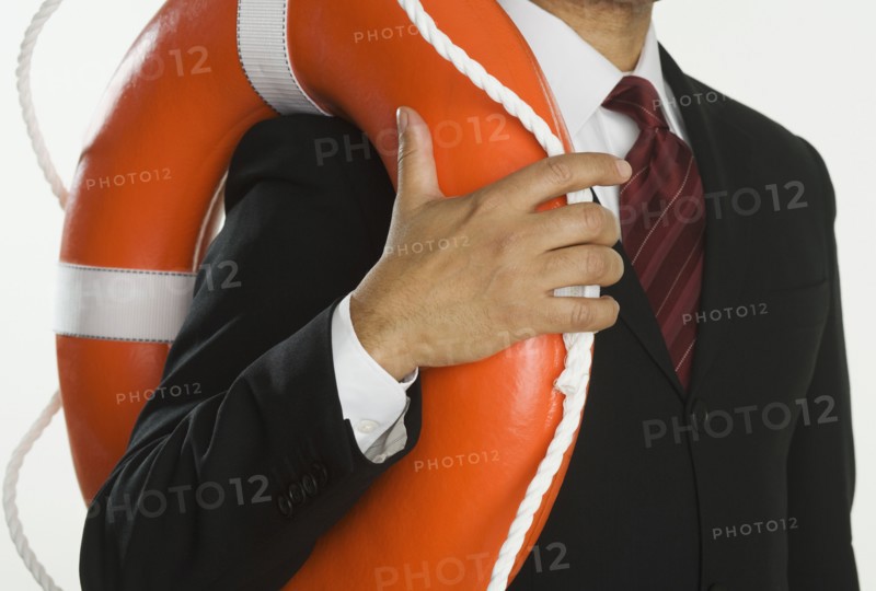 Close up of businessman holding life preserver