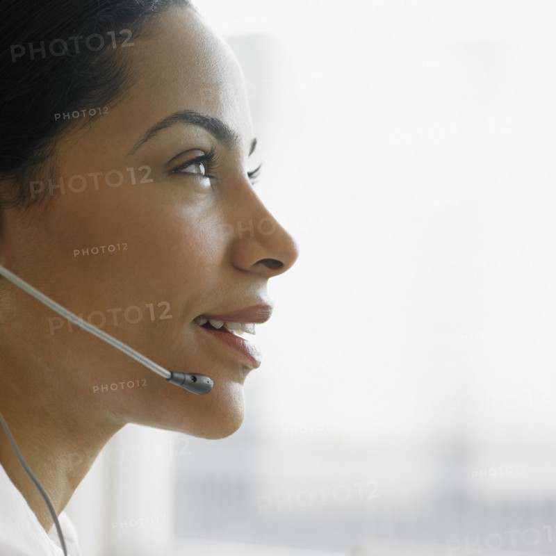African businesswoman wearing headset