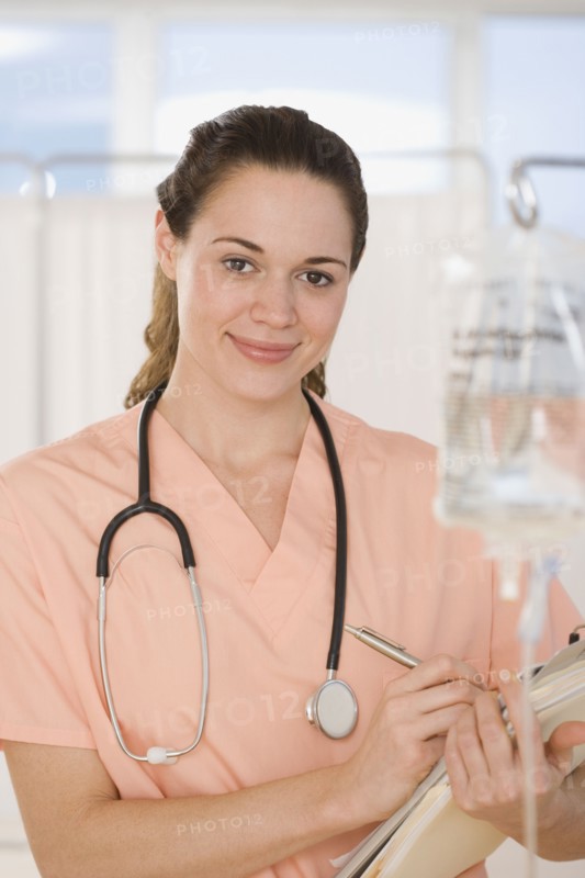 Hispanic female doctor holding chart