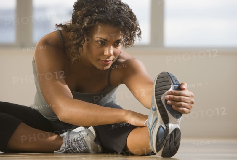 African woman stretching