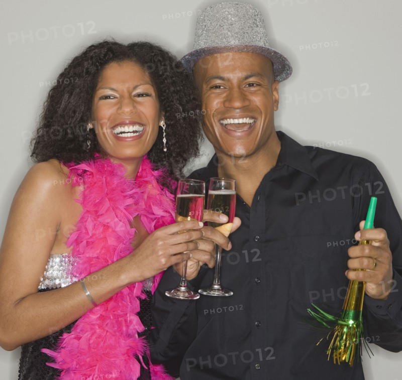 African couple drinking champagne
