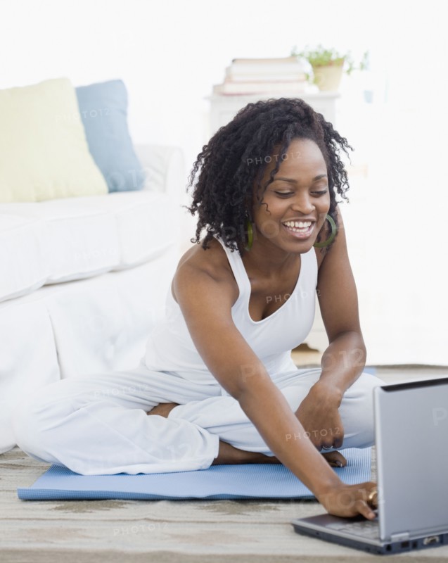 African woman looking at laptop