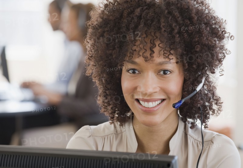 African woman wearing headset