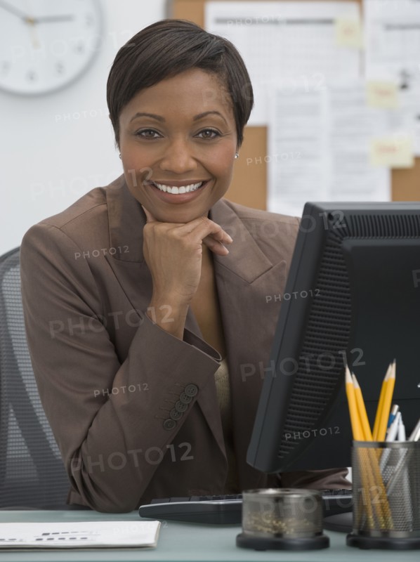 Confident African businesswoman smiling