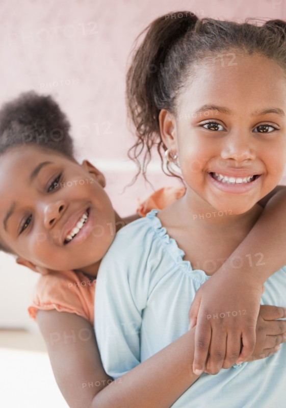 African girls hugging