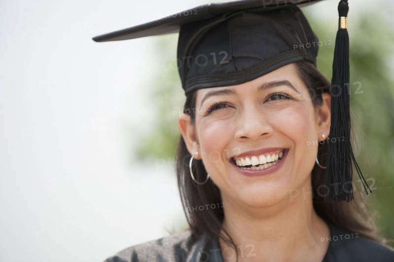 Smiling Hispanic graduate