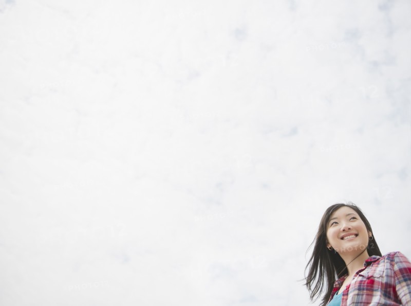 Smiling Korean woman outdoors