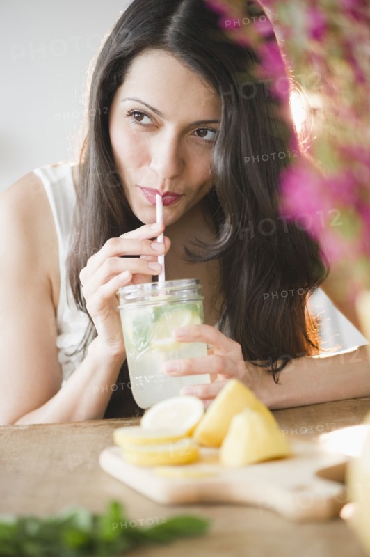 Brazilian woman drinking lemonade