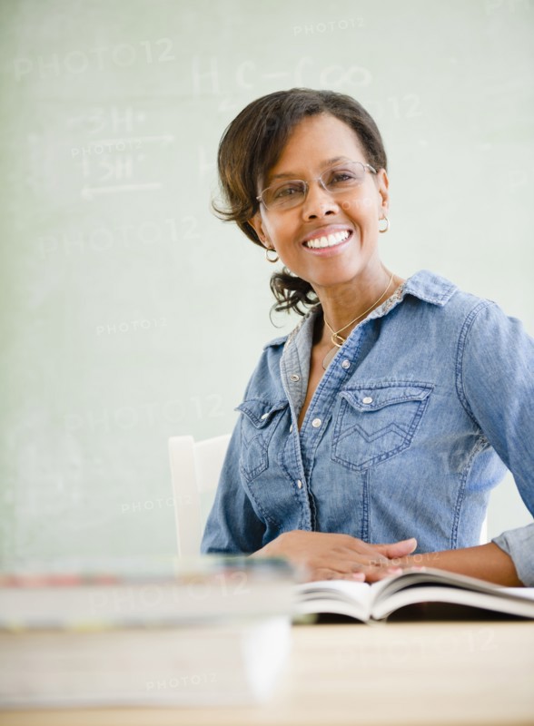 Black teacher in classroom