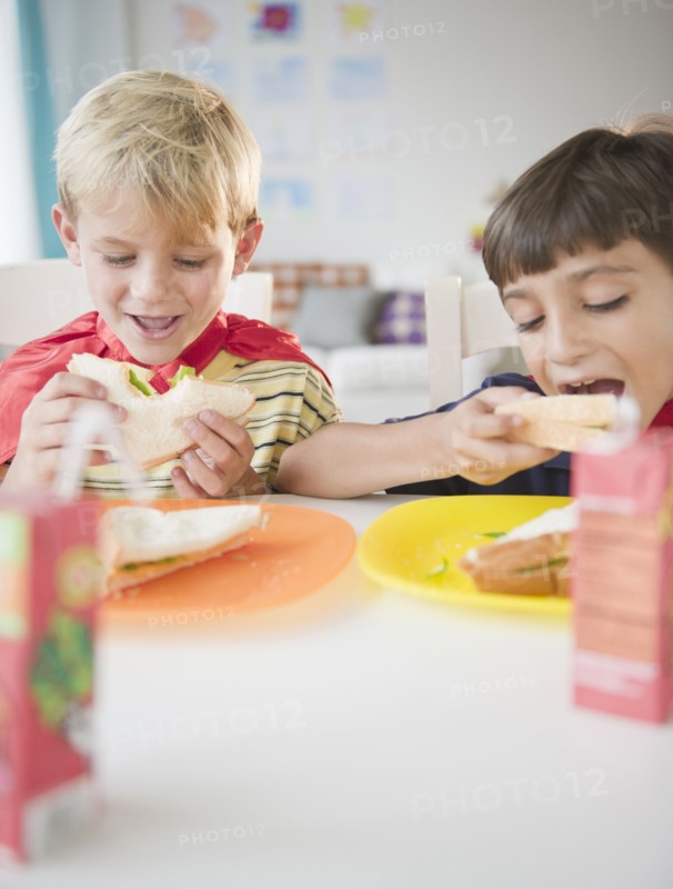 Boys eating lunch together