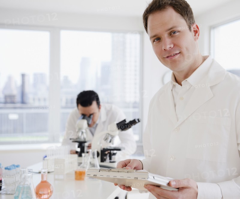 Scientists working in laboratory