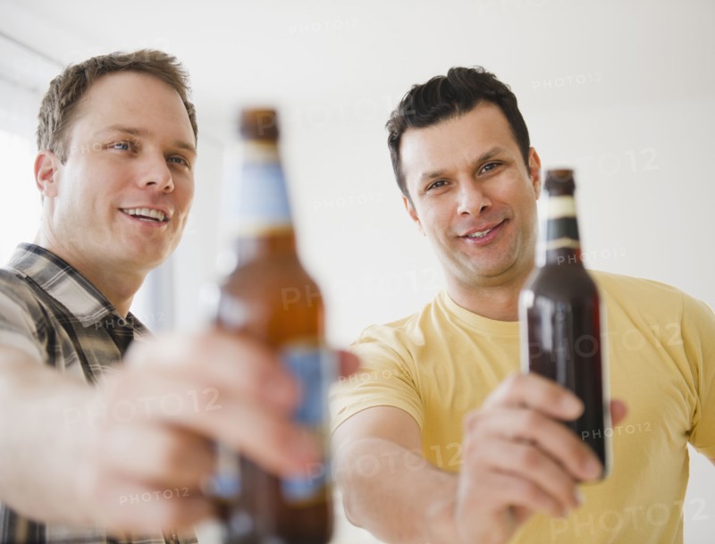 Men toasting together with beer
