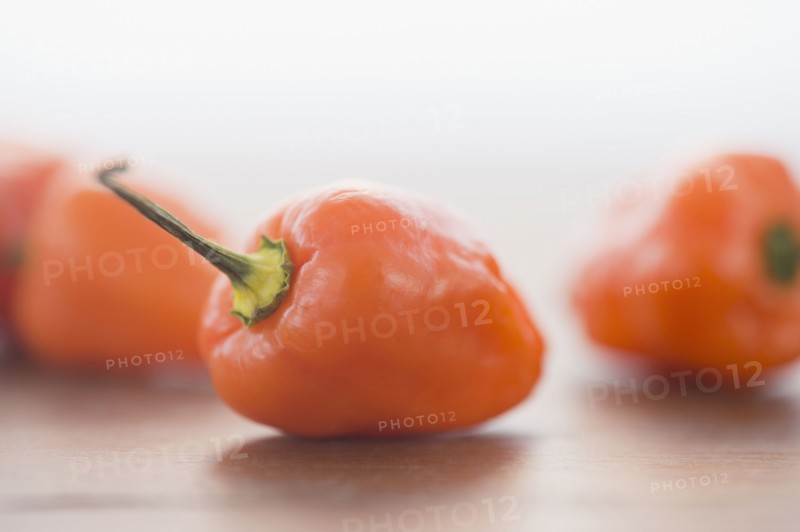 Close up of orange chili peppers
