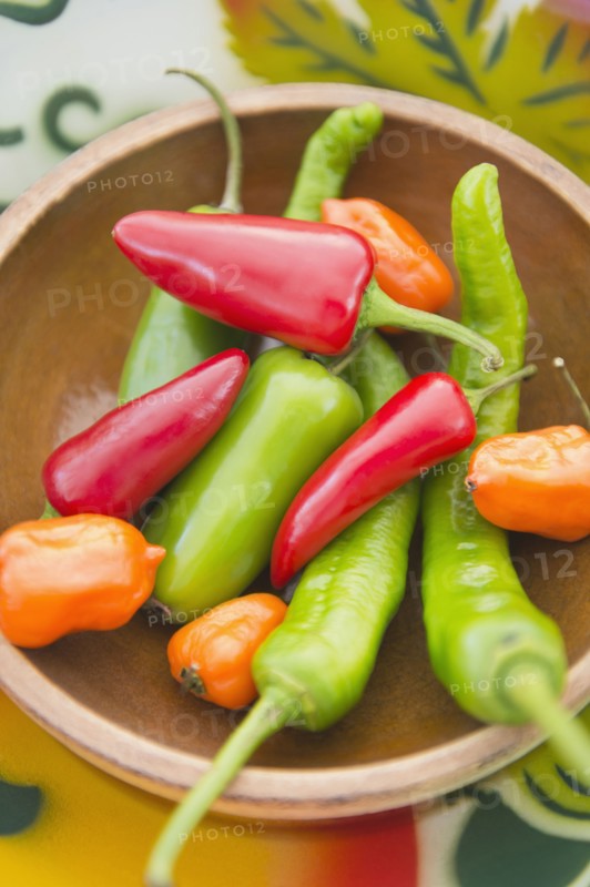 Colorful chili peppers in bowl