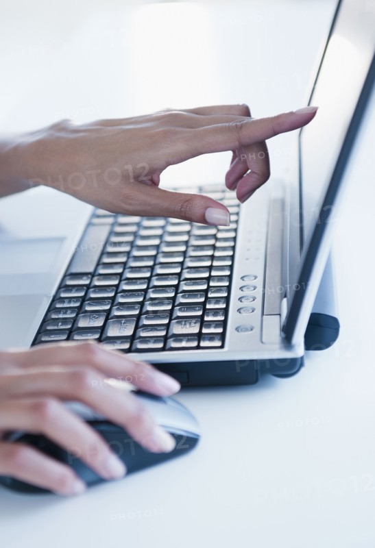 Cape Verdean woman using laptop