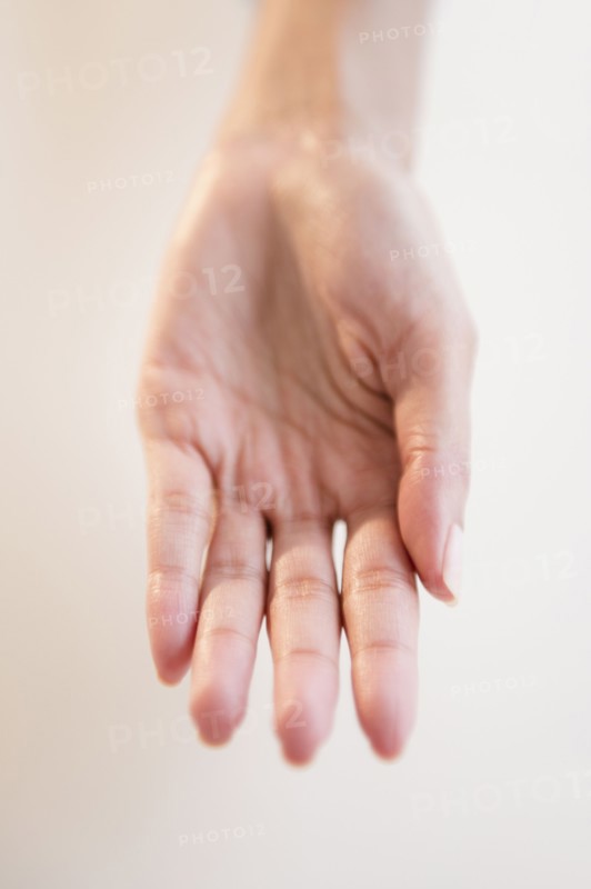 Cape Verdean woman with hand outstretched