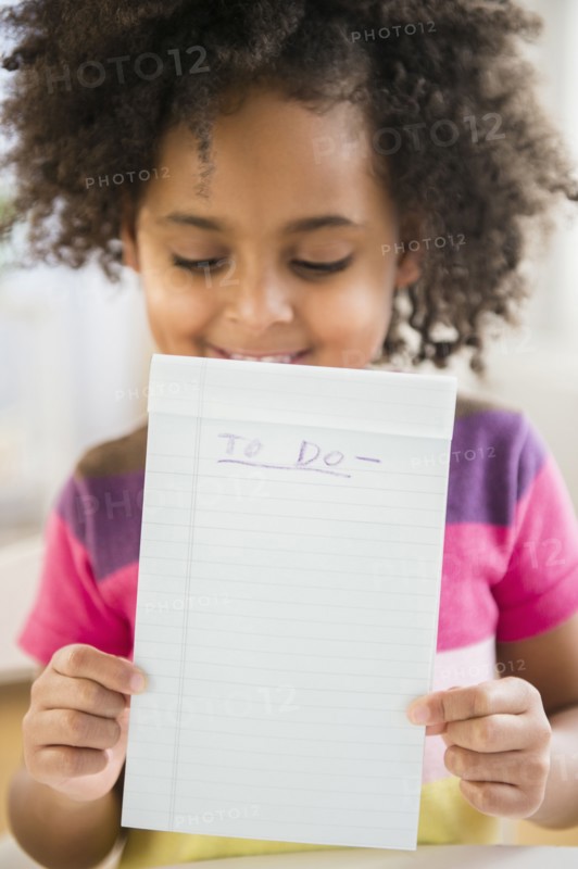 African American girl holding to do list