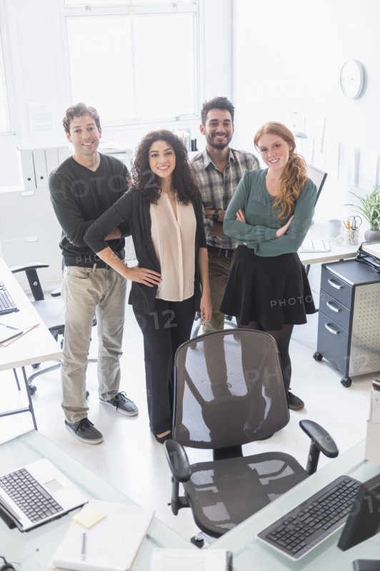 Business people smiling together in office