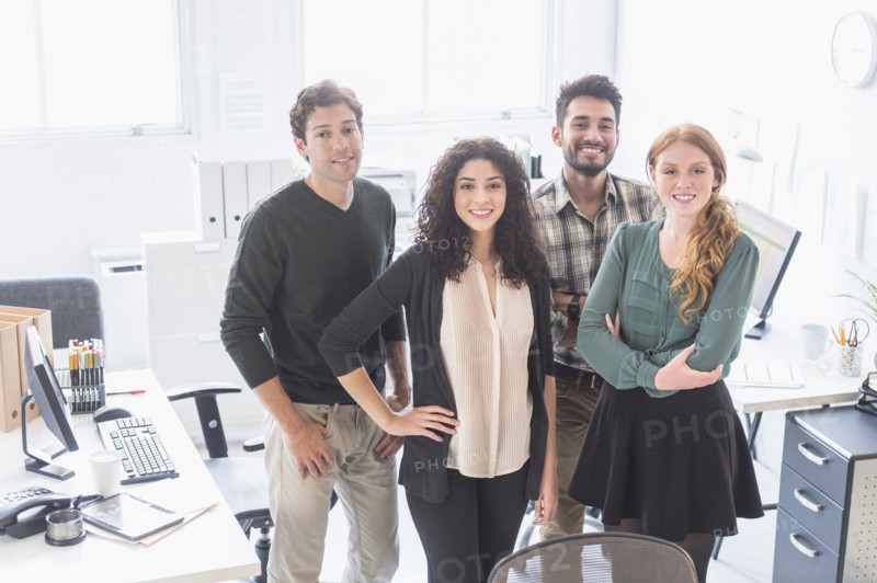Business people smiling together in office